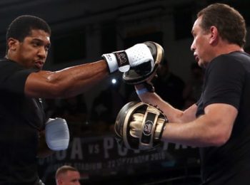 Anthony Joshua stands by Rob McCracken