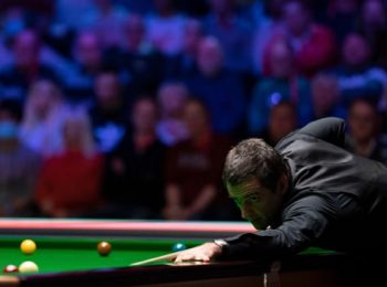 Ronnie O’Sullivan qualifies in style while defending champion Judd Trump crashes out