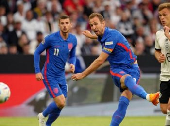 Kane scores late penalty as England holds Germany in Bavaria